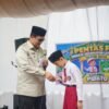 Bupati Haili Yoga Apresiasi Siswa Rutin Tahajud dan Program Baca Al-Quran Dalam Pembukaan Pentas PAI Se-Kecamatan Lut Tawar